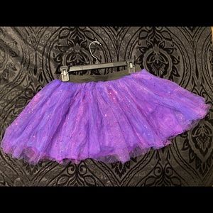 Purple tutu skirt. Size large but runs small.